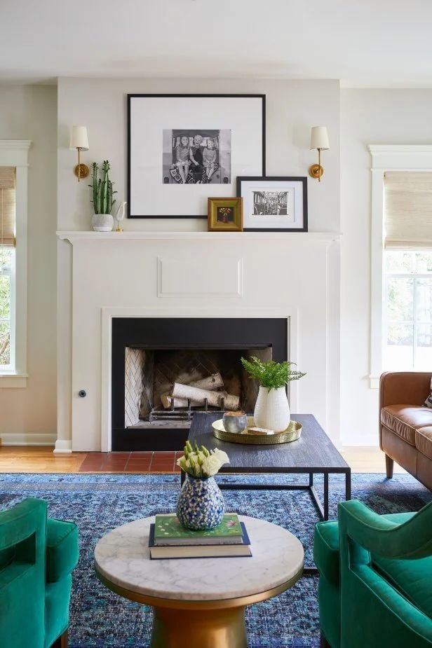 Personalized family artwork displayed prominently above a fireplace