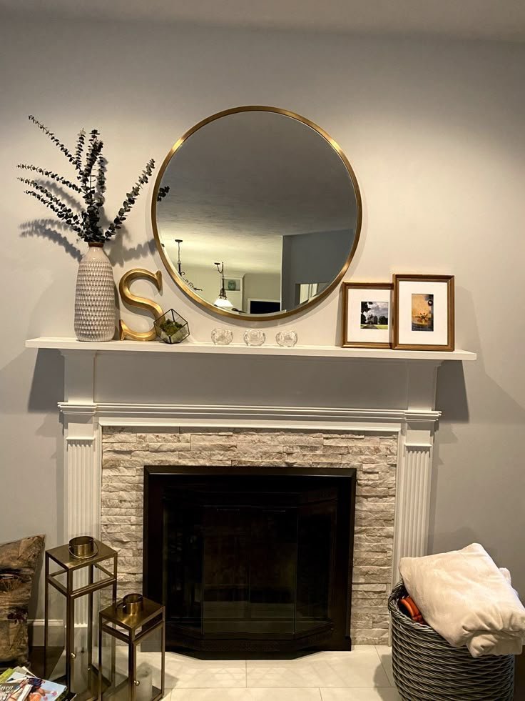 Sculptural decorative object displayed above a fireplace mantel
