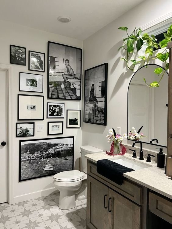 Bathroom art chosen to complement the room's existing style