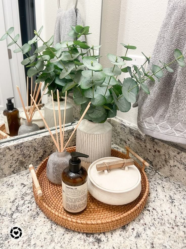 Small art or mirror leaned near a bathroom sink