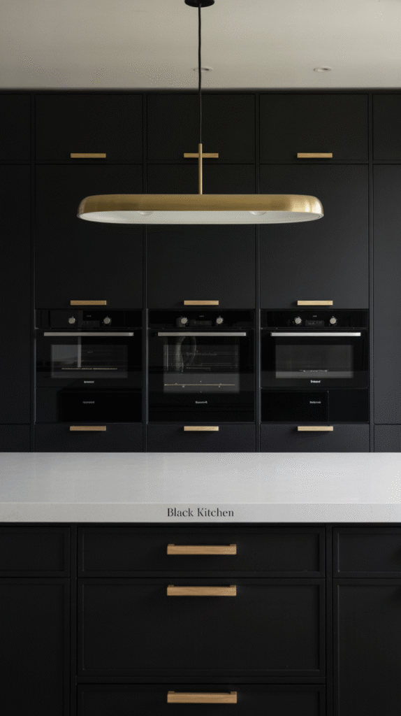 Matte black appliances blending seamlessly into a black kitchen
