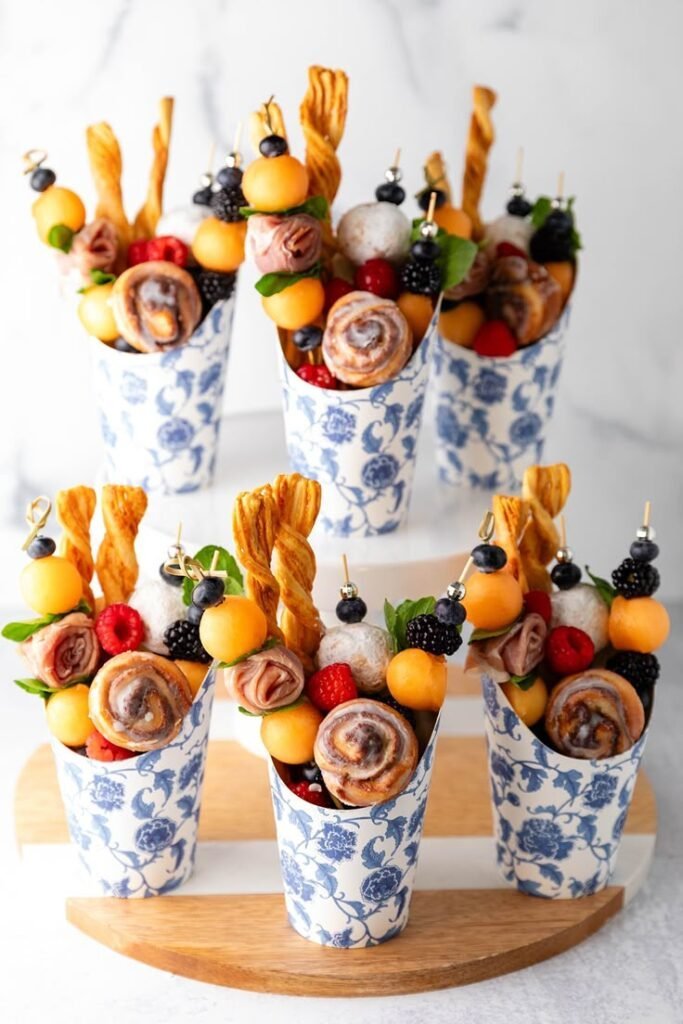 Dessert charcuterie cup styled as a mini sweet sampler