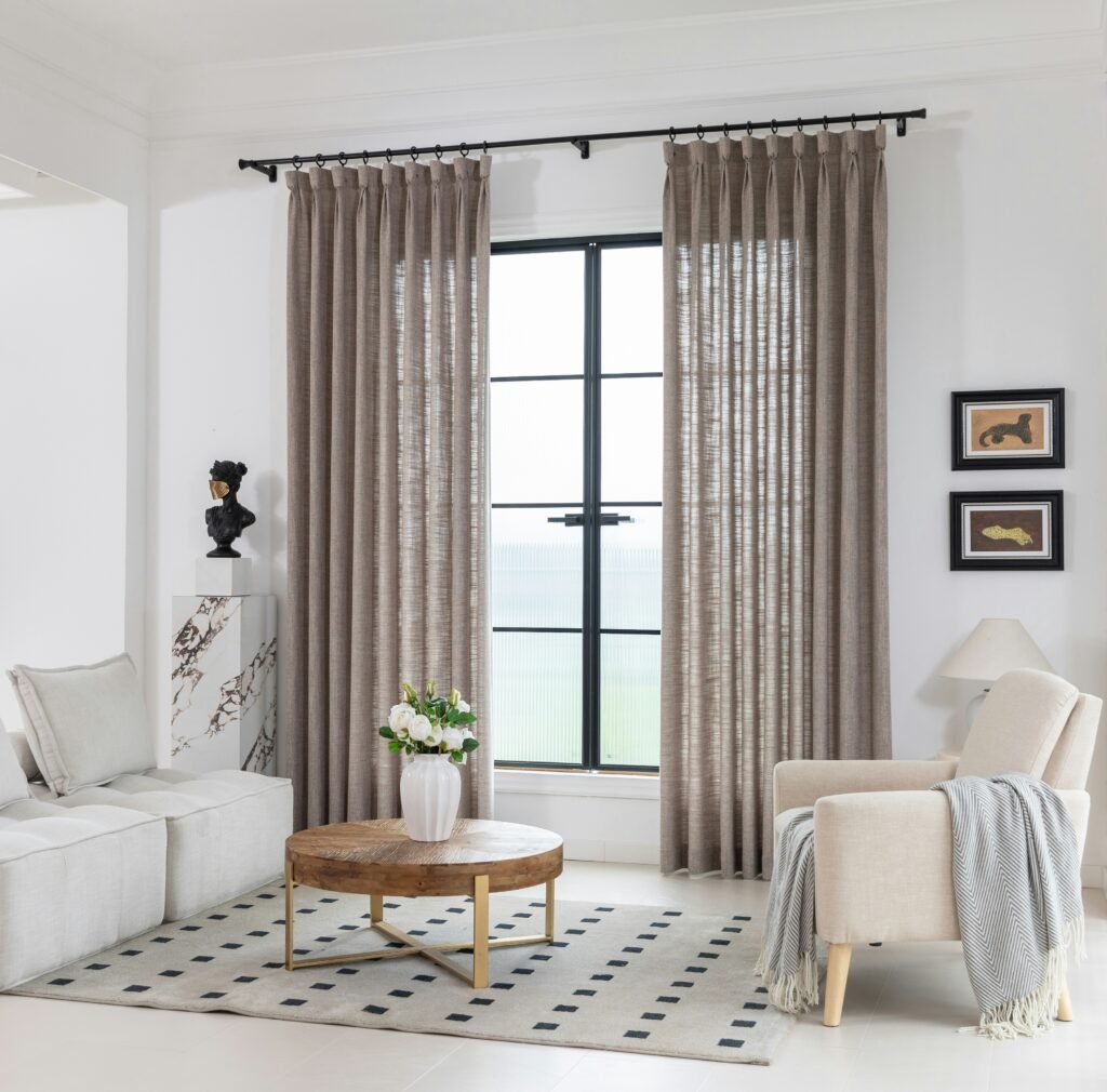 Living room windows framed beautifully by the right curtains