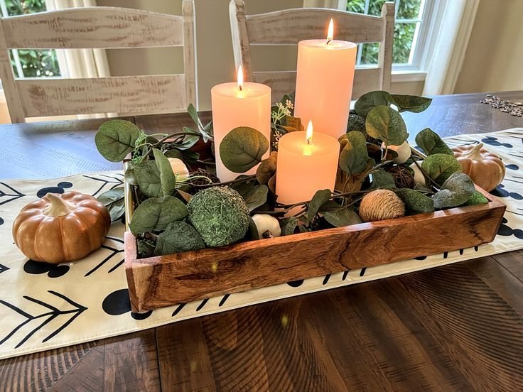 Candle cluster centerpiece with greenery for cozy dining