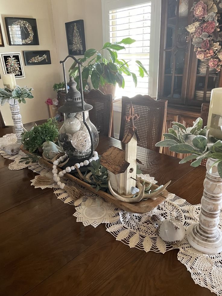 Vintage or antique piece used as a dining table centerpiece