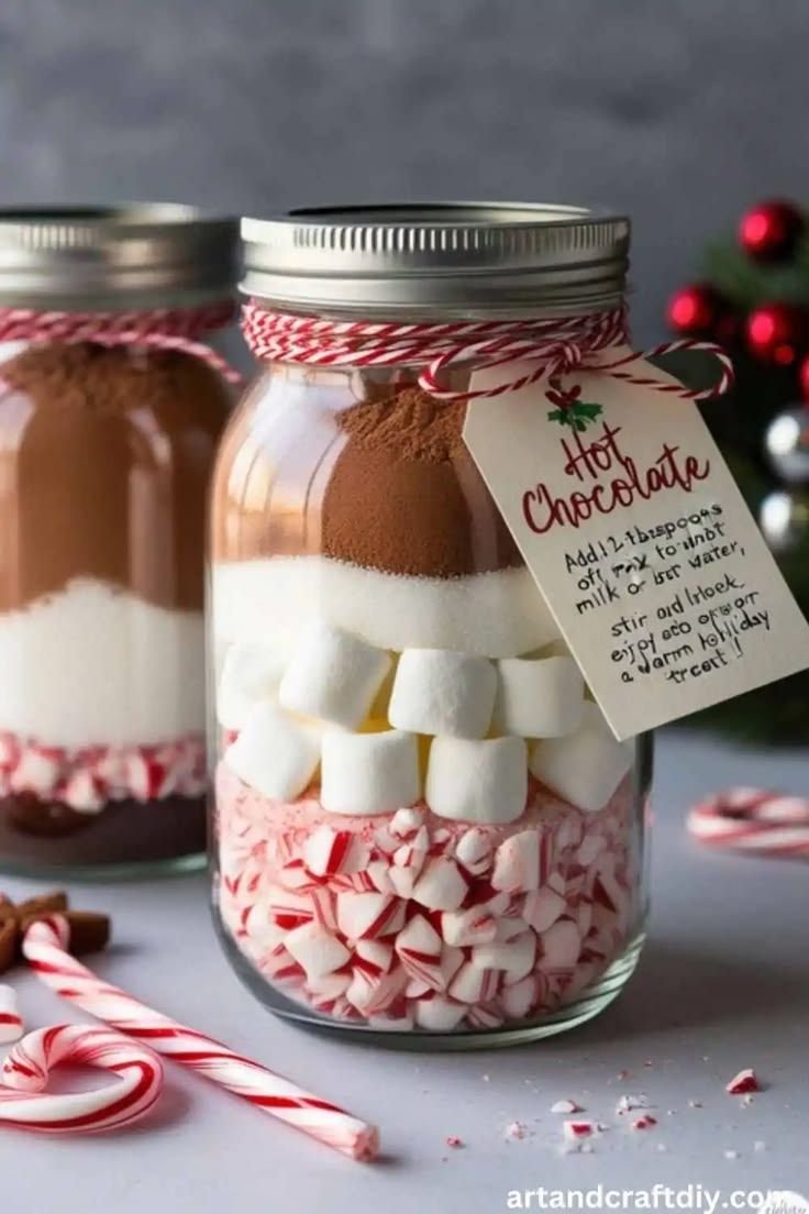 DIY hot chocolate gift jar layered with cocoa and marshmallows