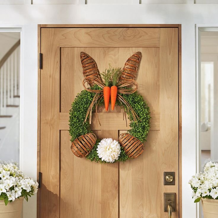 Monogram Easter wreath with a wooden initial surrounded by florals