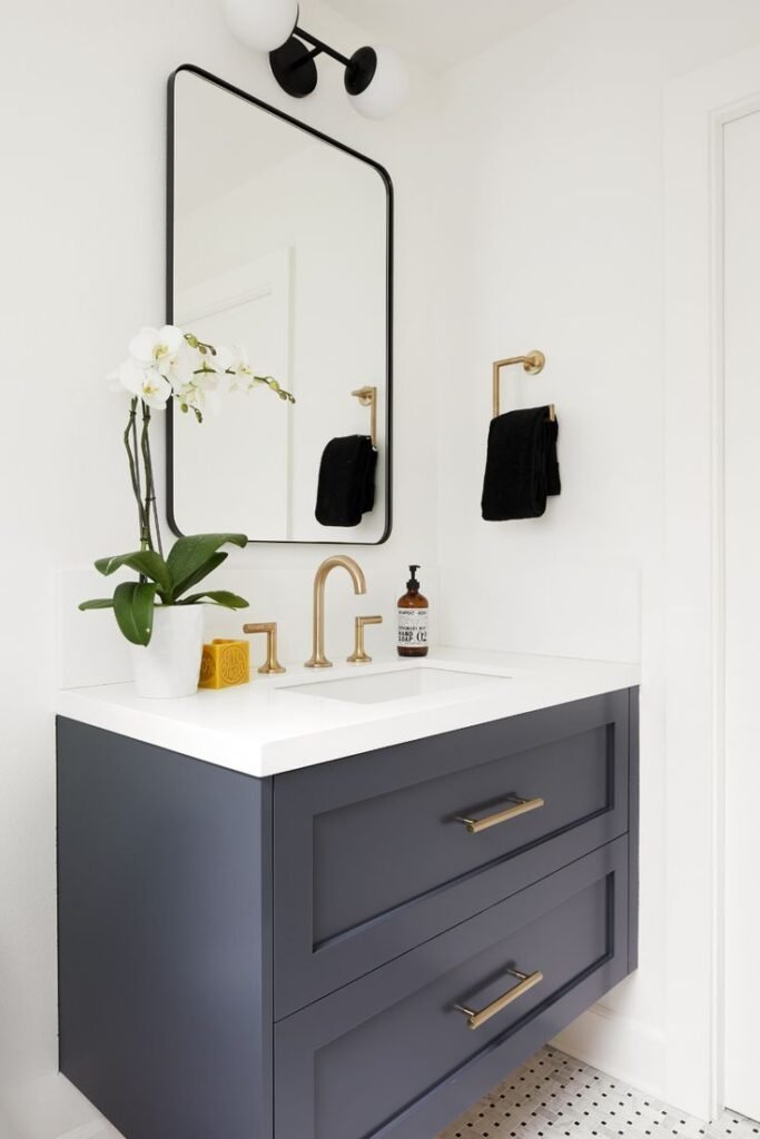 Floating vanity in a narrow powder room with a clean, modern feel