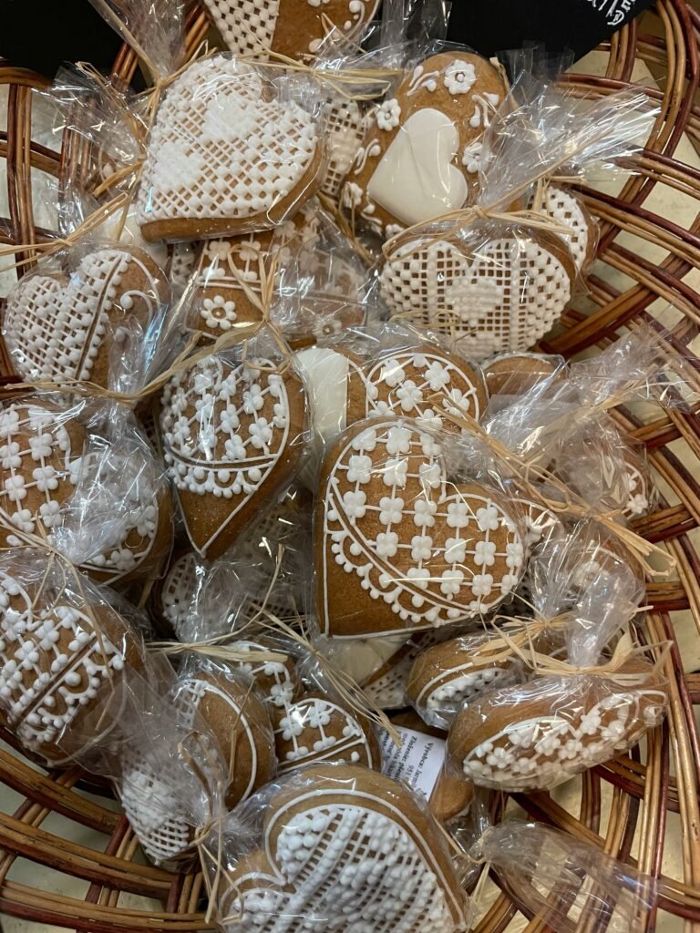 Essential cozy items filling out a thoughtful fall gift basket