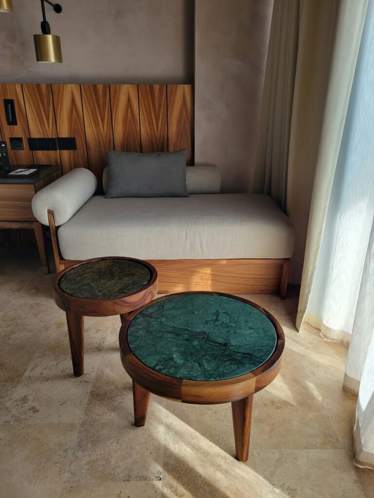 Cozy seating nook adding a welcoming touch to a guest room