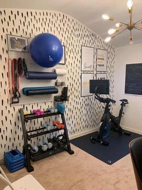 Beginner-friendly home gym setup with resistance bands, a mat and light dumbbells