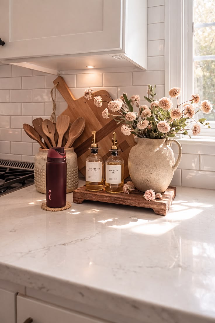 Kitchen counter styled with flowers and a coffee station