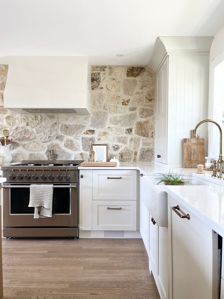 Statement stone backsplash making a bold kitchen design choice