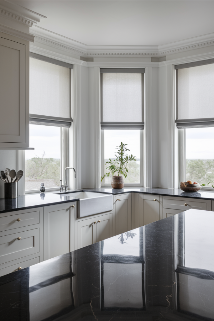 Minimalist roller shades in a sleek, simple kitchen