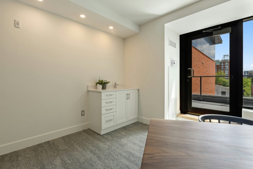 Console table styled thoughtfully in a living room corner