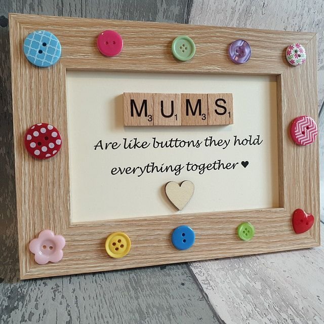 Framed Mother's Day craft with buttons spelling MUMS and a handwritten message