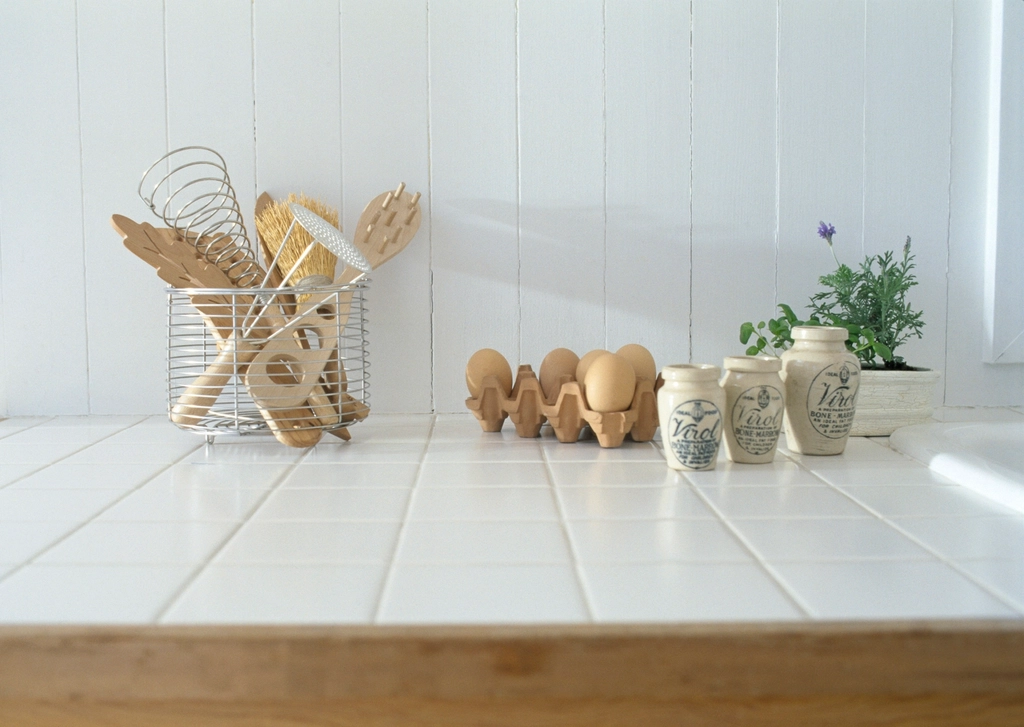 Modern pantry shelving with utensils and stacked dry goods ready for rotation