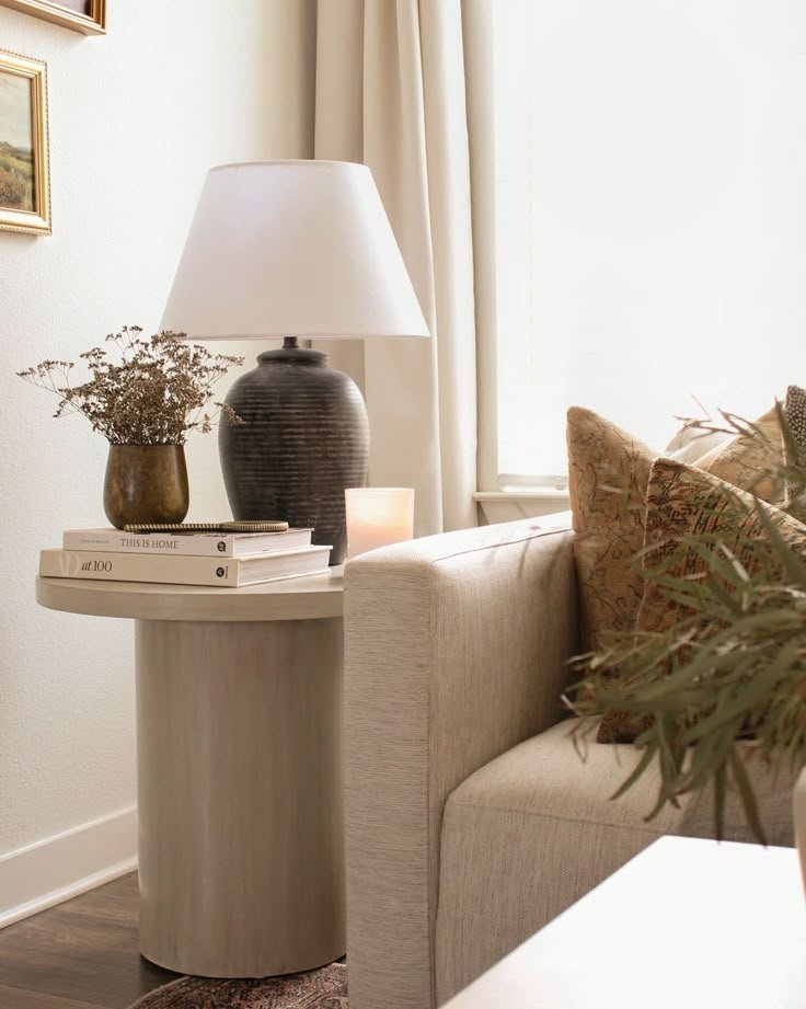 Candles styled on a side table for warm ambient lighting