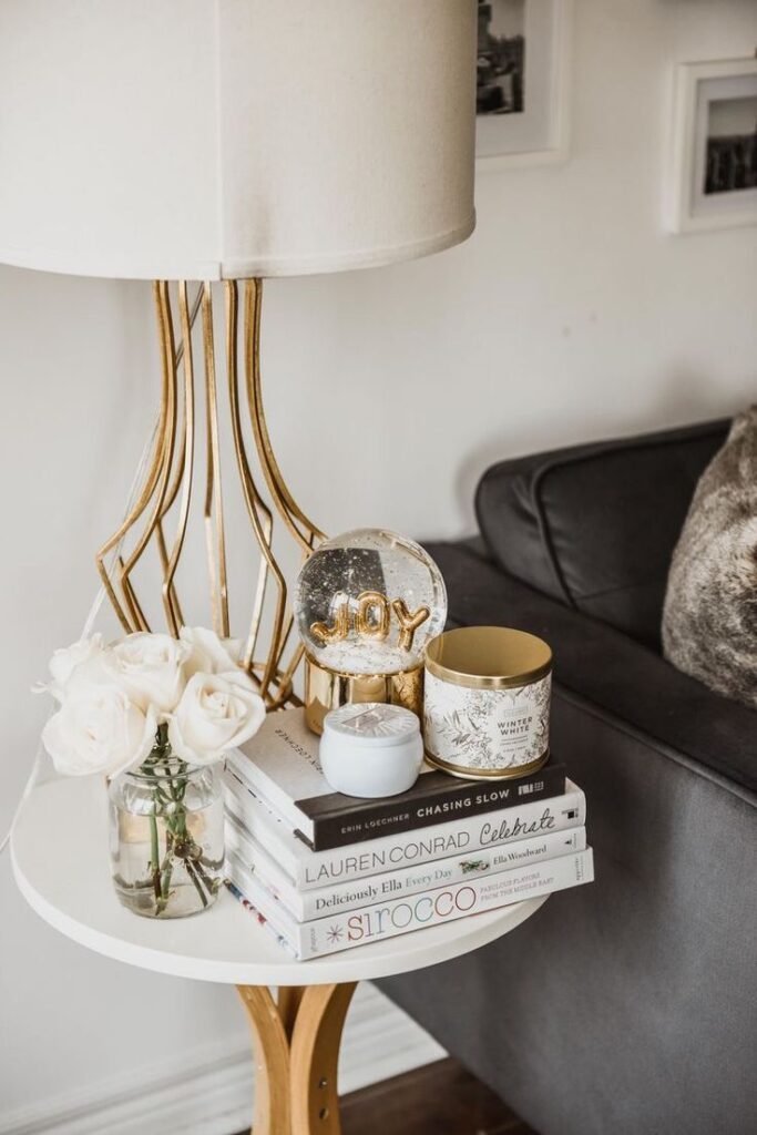 Mixed materials styled together on a side table for visual depth