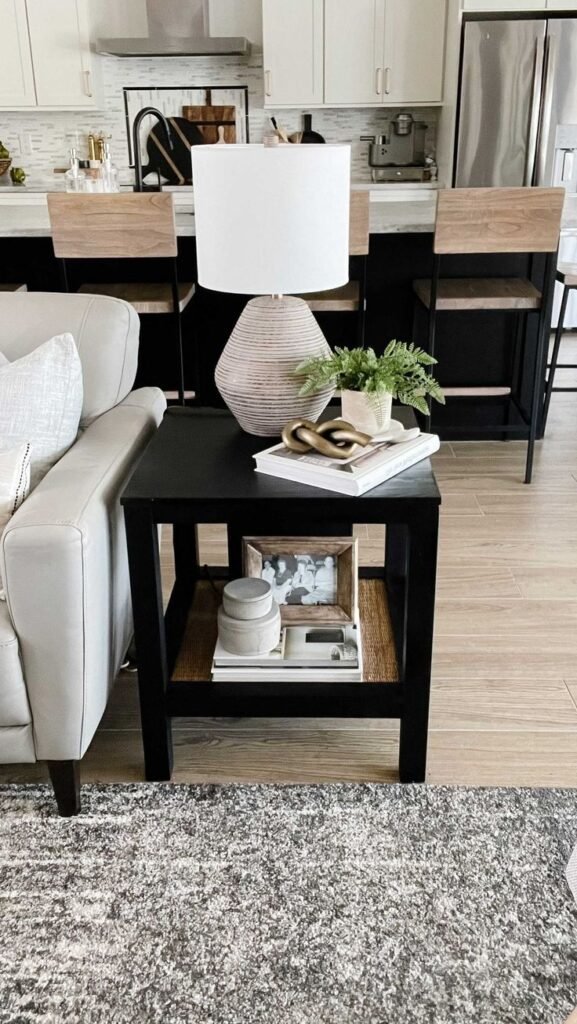 Natural wood and stone decorative accents styled on a side table