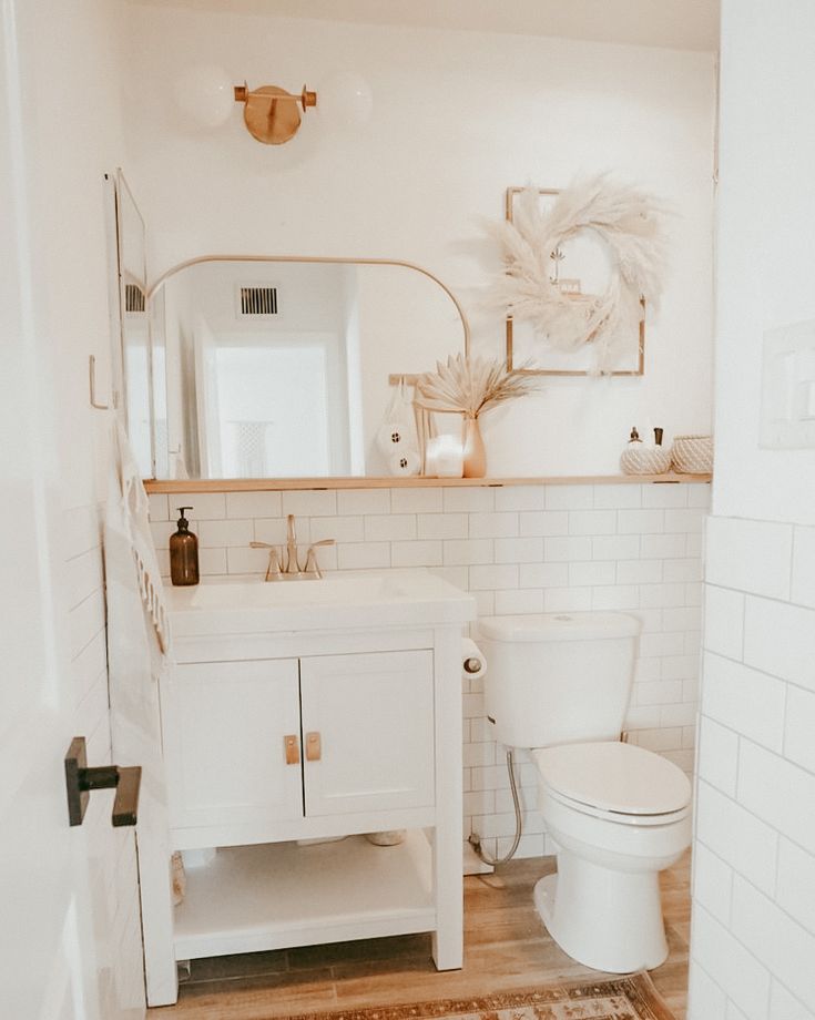 Bathroom vanity with a floating shelf and mirror
