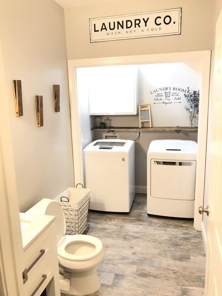Stacked washer and dryer combined into a bathroom layout