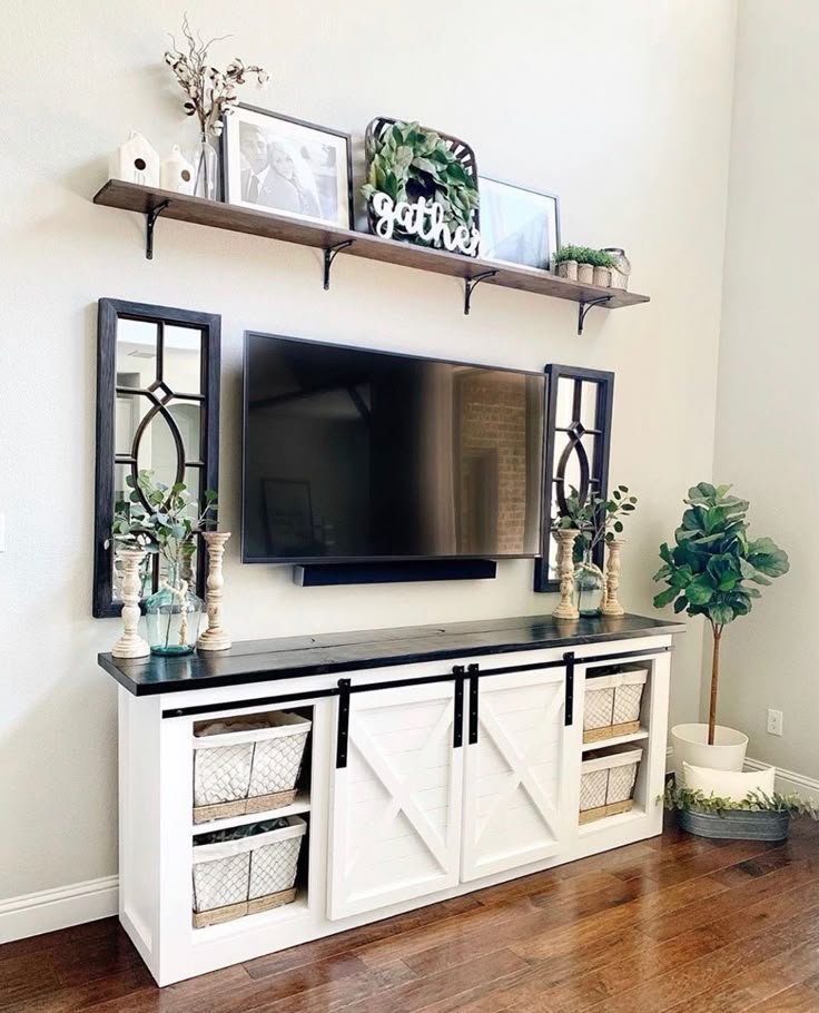 Symmetrical TV stand styling with matching lamps on both ends