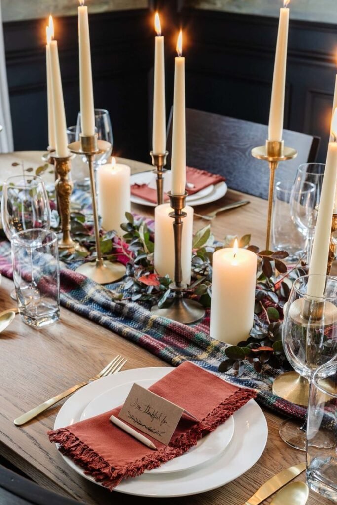 Candles at varying heights creating visual rhythm on a winter dining table